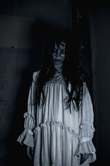 portrait female ghost with a face full of hatred and horror wearing a white dress in a haunted room