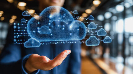 A person is holding a blue cloud in their hand. Concept of technology and innovation, as the cloud is a symbol of data storage and processing
