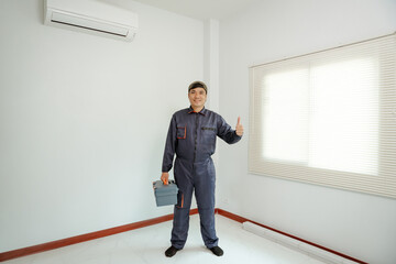 Portrait of a professional installer holding a toolbox, standing confidently in front of modern blinds, bright and organized workspace.