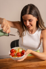 Young woman smiling healthy salad bowl fresh vegetables lifestyle eating diet tomatoes wellness nutrition