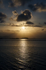landscape of sea at sunset with cloudy sky