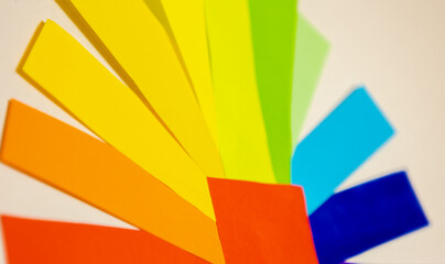 Strips of paper making a chromatic range with various shades, color range concept