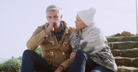 Comfort, support and talking with senior couple in outdoor for sad, depression and bad news. Communication, anxiety and mental health with elderly man and woman for retirement, bonding and empathy