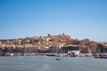 Cagliari harbor view. Capital city of Sardinia, a famous island and touristic holiday destination in South Italy.