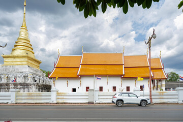 Beautiful temple with a long history The golden pagoda symbolizes the sanctity and prosperity of the temple.