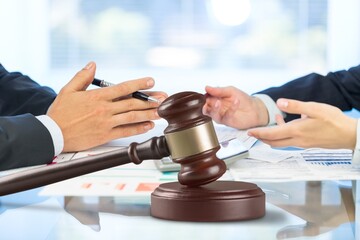 Lawyer Legal signed contract with wooden gavel