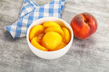 Ripe sweet and juicy canned peach