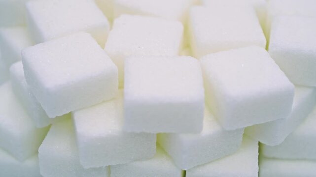 High angle view rotation of sugar lumpy close-up