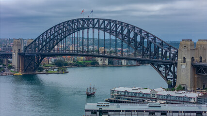 Naklejka premium Aerial Drone view of Sydney Harbour bridge and Harbour foreshore Sydney NSW Australia
