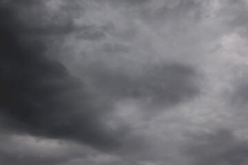 Fototapeta premium Dramatic dark cloudy sky before rain and storm. rainy sky black clouds landscape. nature abstract background