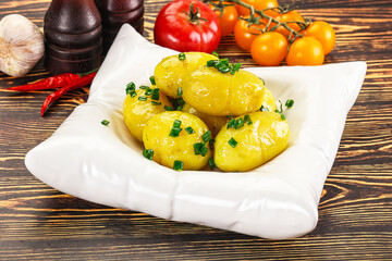 Boiled young potato with green onion