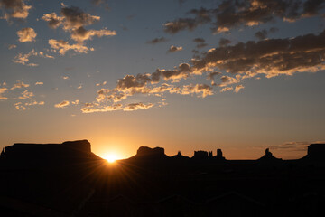 Monument Valley rock formations at sunrise