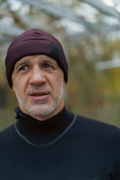 Middle aged man kite surfer