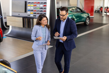 Car dealership, salesman or happy woman shaking hands for vehicle, finance agreement or purchase....