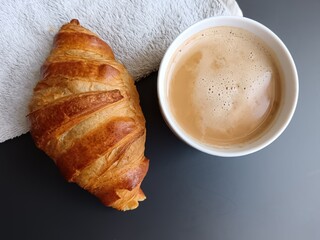 cup of coffee and croissant