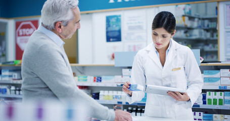 Customer, tablet and pharmacist with pills for help, cure or prescription drugs in retail store....