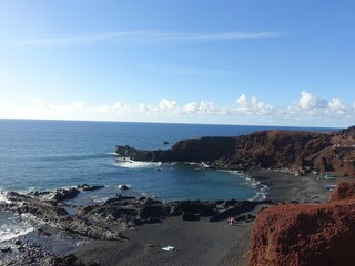 El Golfo's volcanic landscape and black sand beach.