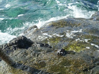 Waves crashing on rocky coastline