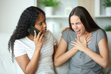 Woman choking and partner calling doctor with phone