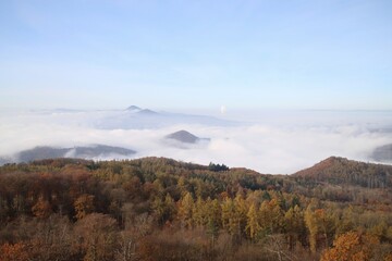 view of the inversion in the valley. only the tops of the hills are visible.