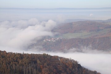 view of the inversion in the valley. only the tops of the hills are visible.