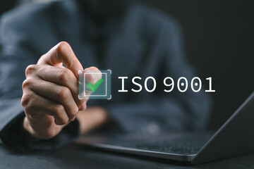Obraz premium ISO 9001 Standard certification standardisation quality control concept. Person use laptop and choose ISO 9001 on virtual screen for certified and quality management of organizations