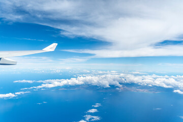 a view of hawaii outside of an airplane window