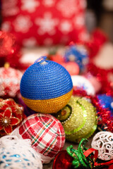 Christmas tree bauble among variety of other Christmas decorations