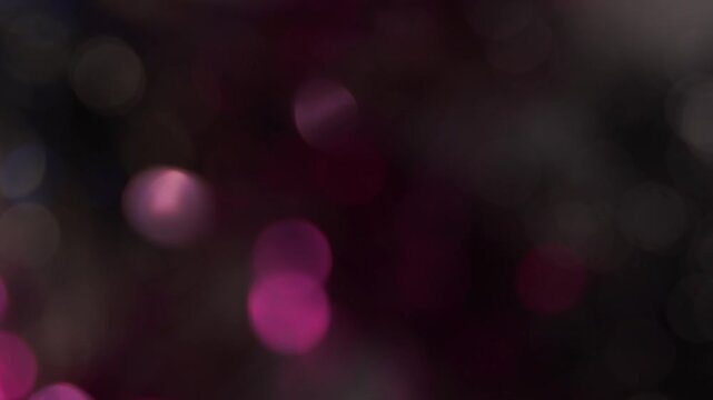 arri&egrave;re plan en plan fixe effet de bulles de bokeh artistique et festif, avec fondu au noir, id&eacute;e de transition artistique