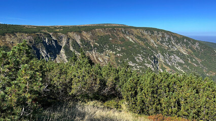 Naklejka premium Panorama, Mountain hiking trail leading to the top of Mount Sniezka, Poland. Mountain landscape