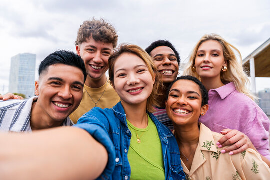 Urban young people taking selfie having fun together