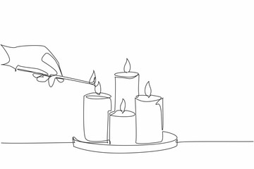 Single continuous line drawing hand hold a match, lighting a group of candles arranged on a tray. Bringing light into the world. Soothing light. World Candle Day. One line design vector illustration