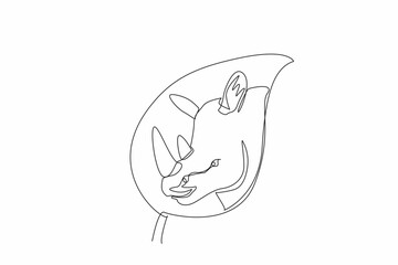 Single one line drawing the rhinoceros head in the middle of the leaf. Let it live in nature. Stop illegal hunting. Natural habitats. World Wildlife Day. Continuous line design graphic illustration