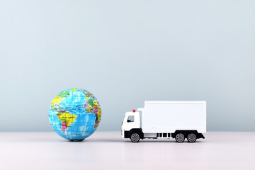 White toy truck on a light background, space for text.