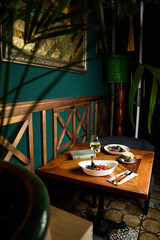 Beautifully served dinner in a restaurant, dishes from the chef, signature cuisine