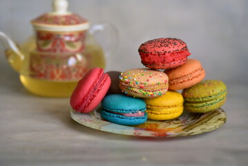 colorful macaroons on a wooden table
