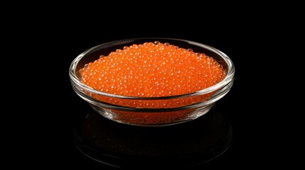 Fresh Salmon Roe in a Clear Bowl on Black Background