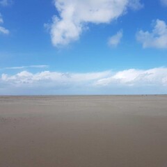 sand beach and blue sky