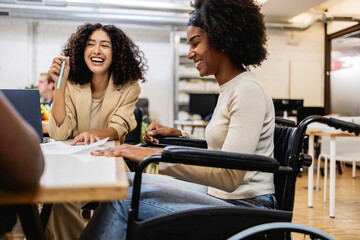 Multiracial coworkers collaborating in modern office, embracing diversity and inclusion