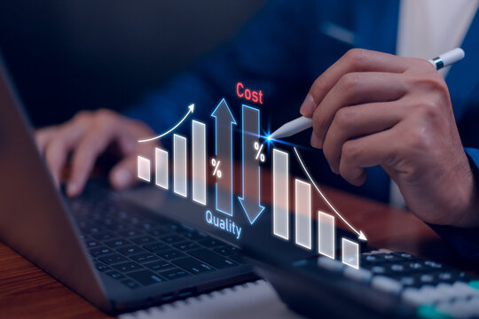 Cost and quality control, business strategy and project management concept. Businessman use computer laptop with quality control growth graph and cost reduction, control budget cost and improvement.