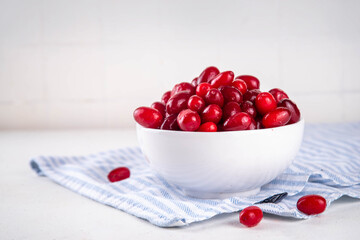 Cornelian cherry, dogwoods edible berry in white bowl