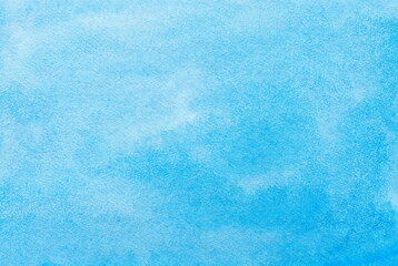 An abstract illustration of blue watercolor with a paper texture, perfect for grunge designs, vintage cards, and templates.
