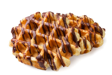 Belgian waffle with chocolate close-up on white. Isolated
