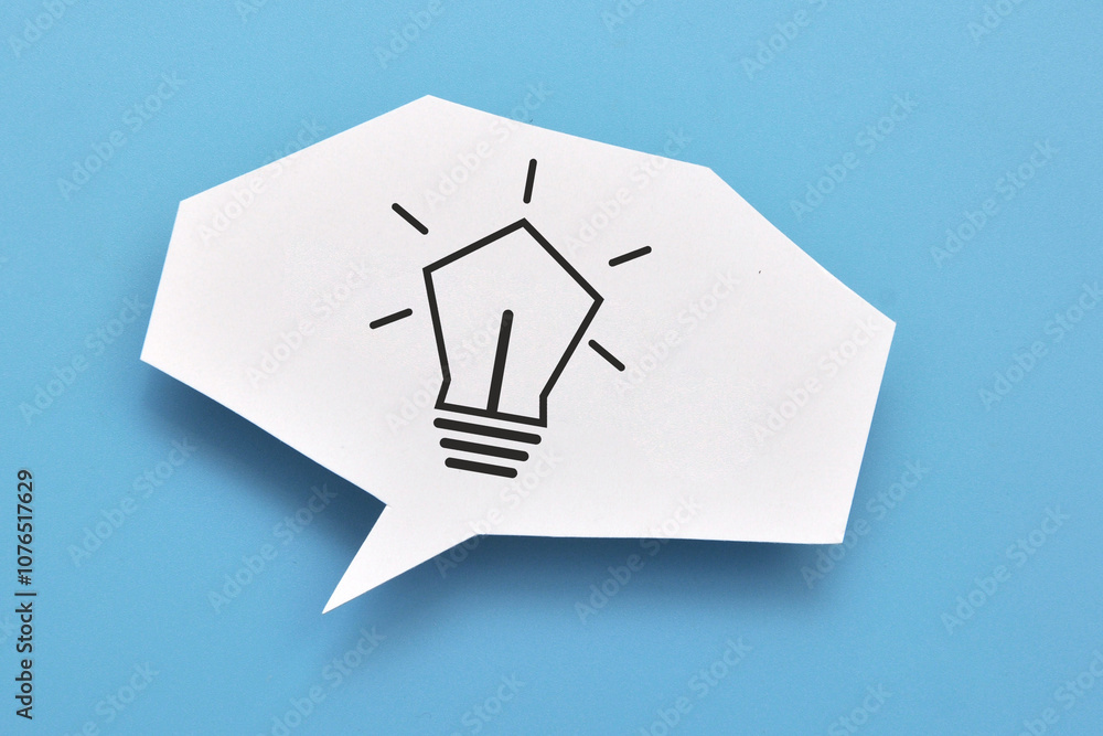 Poster a speech balloon with a light bulb pattern on it. a symbol of the emergence of a creative idea
