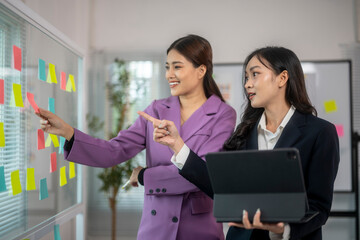 They are smiling and seem to be discussing something important