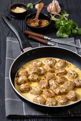 Ground poultry meatballs in a white cream gravy