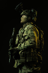 Profile of Soldier in Tactical Gear with Night Vision and Rifle