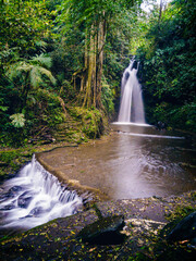 Obraz premium the figure of a beautiful princess depicted by a waterfall. One of the hidden gems in Kuningan.