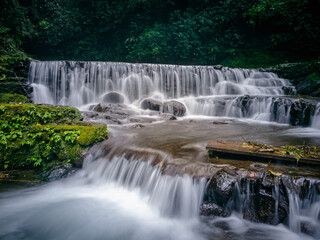 Obraz premium the figure of a beautiful princess depicted by a waterfall. One of the hidden gems in Kuningan.