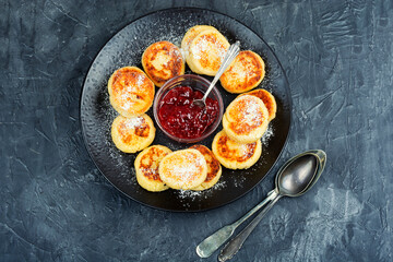 Cottage cheese pancakes or curd fritters stack.